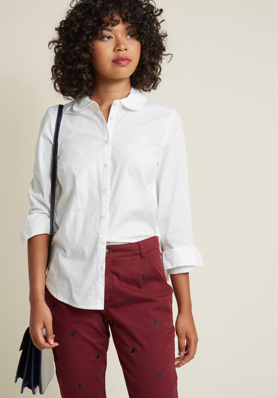  - Innovation is your area of expertise, which is evident by the eye-catching updates to this classic navy button up. With the perfect Peter Pan collar, petite wooden buttons, and a swipe of slate blue inside each sleeve cuff, this ModCloth namesake label bl