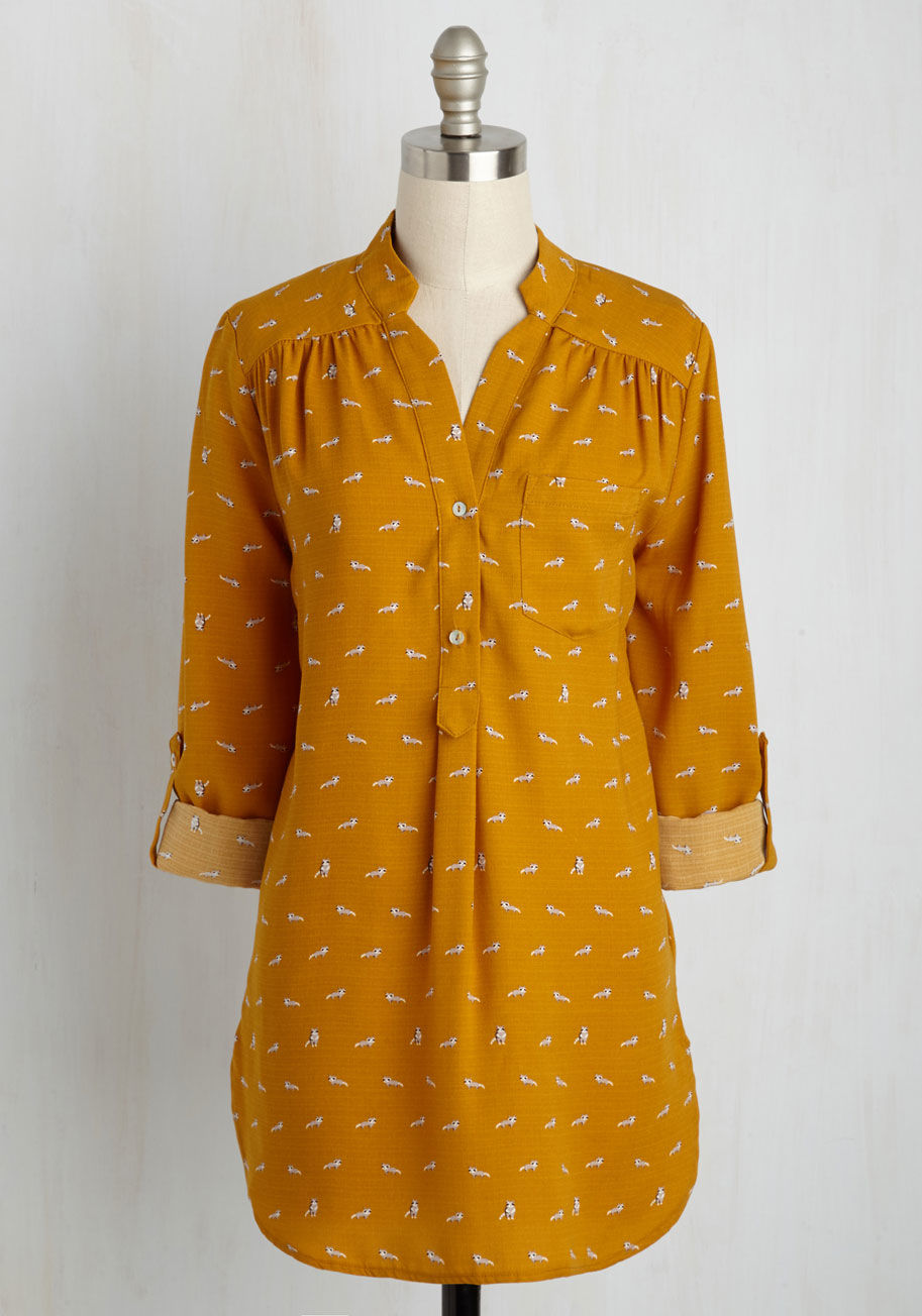  - It&rsquo;s no surprise that this navy top has become your favorite seperate. How could you not love the pleated shoulders, front pocket, and curved hem of this woven wonder? Top it all off with the adorable owl print, and this buttoned blouse is the most 
