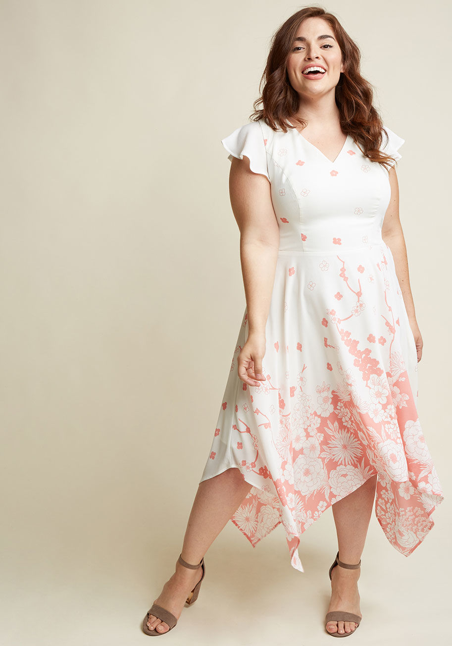  - Lured by the crickets' song and flowers' sway, you slip into this ivory dress and join the performance. Twirling its handkerchief hem's brilliant pink blossoms, you feel a breeze dance past the flutter sleeves and open back of this ModCloth namesake label