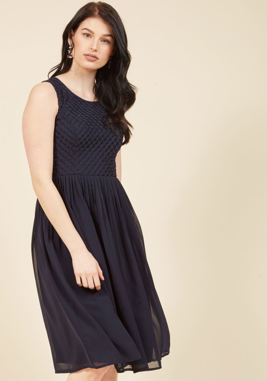  - Never one to leave a celebration early, you don this dove grey midi dress knowing you'll be careening 'til the last dance. And, with its embroidered, beaded bodice, buttoned back keyhole, and pleated chiffon skirt, this ModCloth-exclusive dress looks abso
