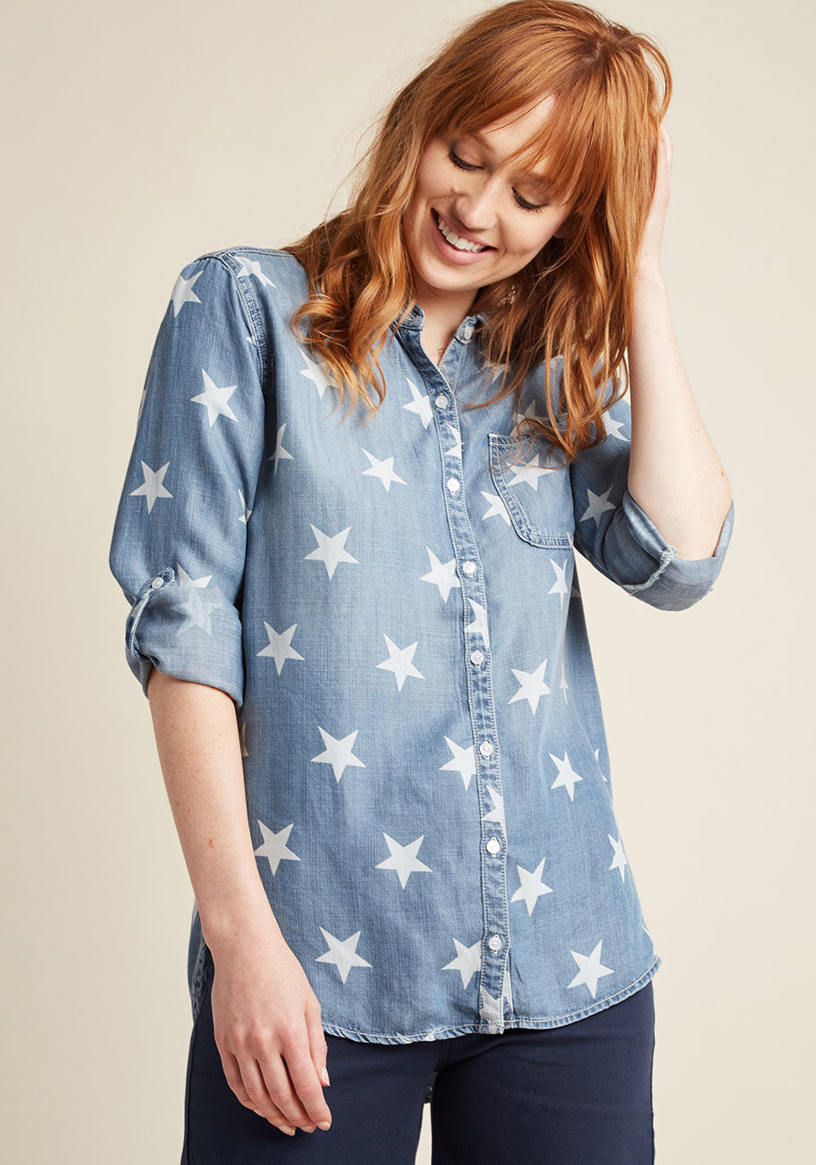  - Our one wish is to witness the many ways you can find to style this soft chambray top! Touting tab sleeves, a chest pocket, side vents, and a back pleat, this star-spangled button up brings brilliance to your casual ensembles.
