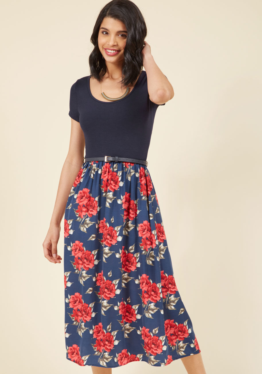  - Reading a passage from your latest book is a breeze with this navy midi dress