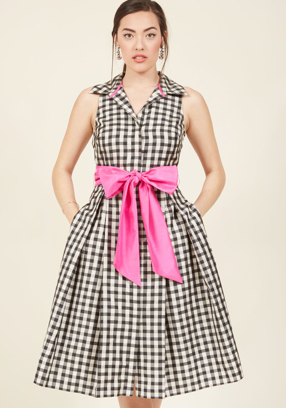  - Refresh what it means to look your very best with the help of this black and white shirt dress! A '50s-inspired cut printed with jacquard gingham sets the foundation for this Eliza J frock, as its modern pockets and magenta contrast sash breathe new life 