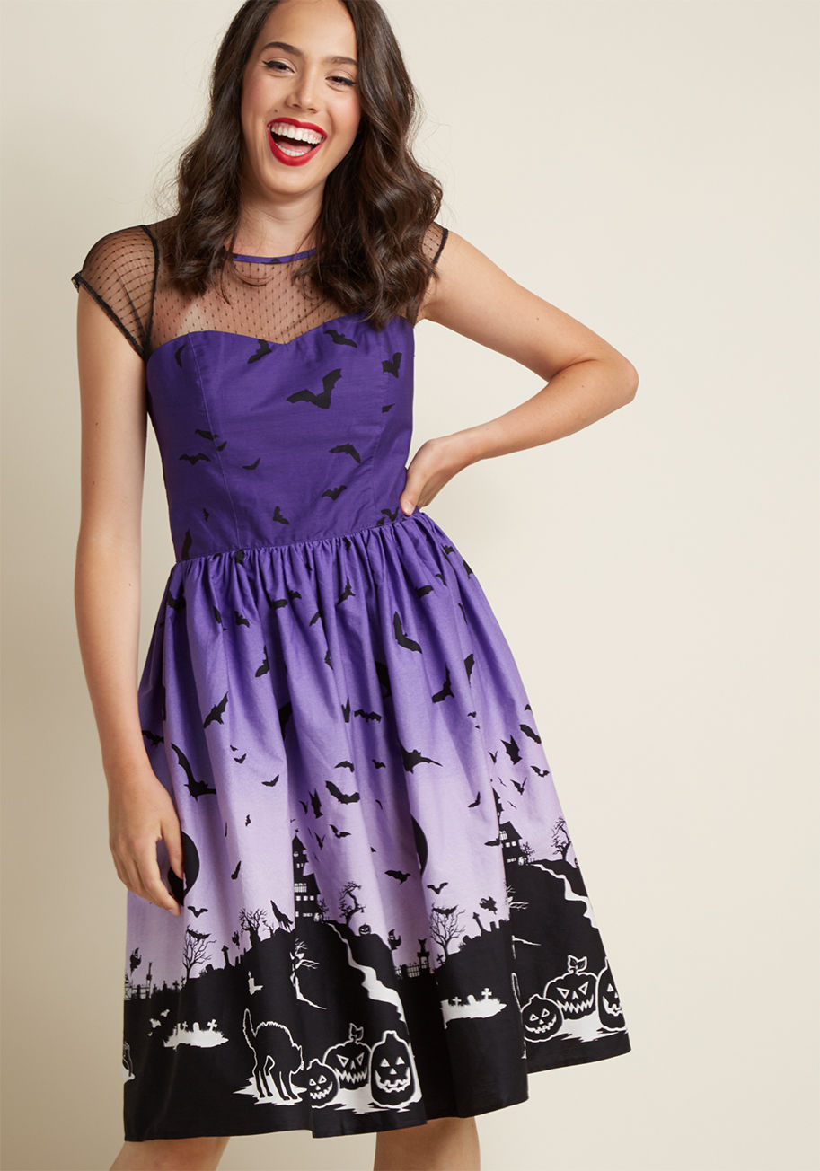  - Some may call this festive A-line dress spooky, but