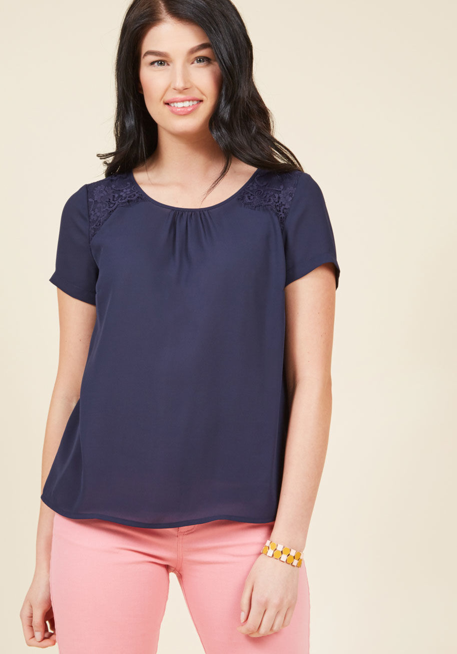  - Stats say this navy blue blouse is going to be the most versatile piece