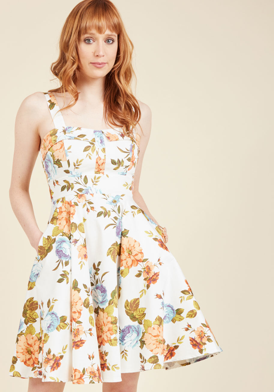  - Strutting stylishly past the cafe, you overhear onlookers rave about that &ldquo;rockabilly diva's beautiful red dress! With a collared-and-padded bust, one-inch straps, and a swingy, A-line cut, your embossed, back-tied frock - a ModCloth exclusive - ste