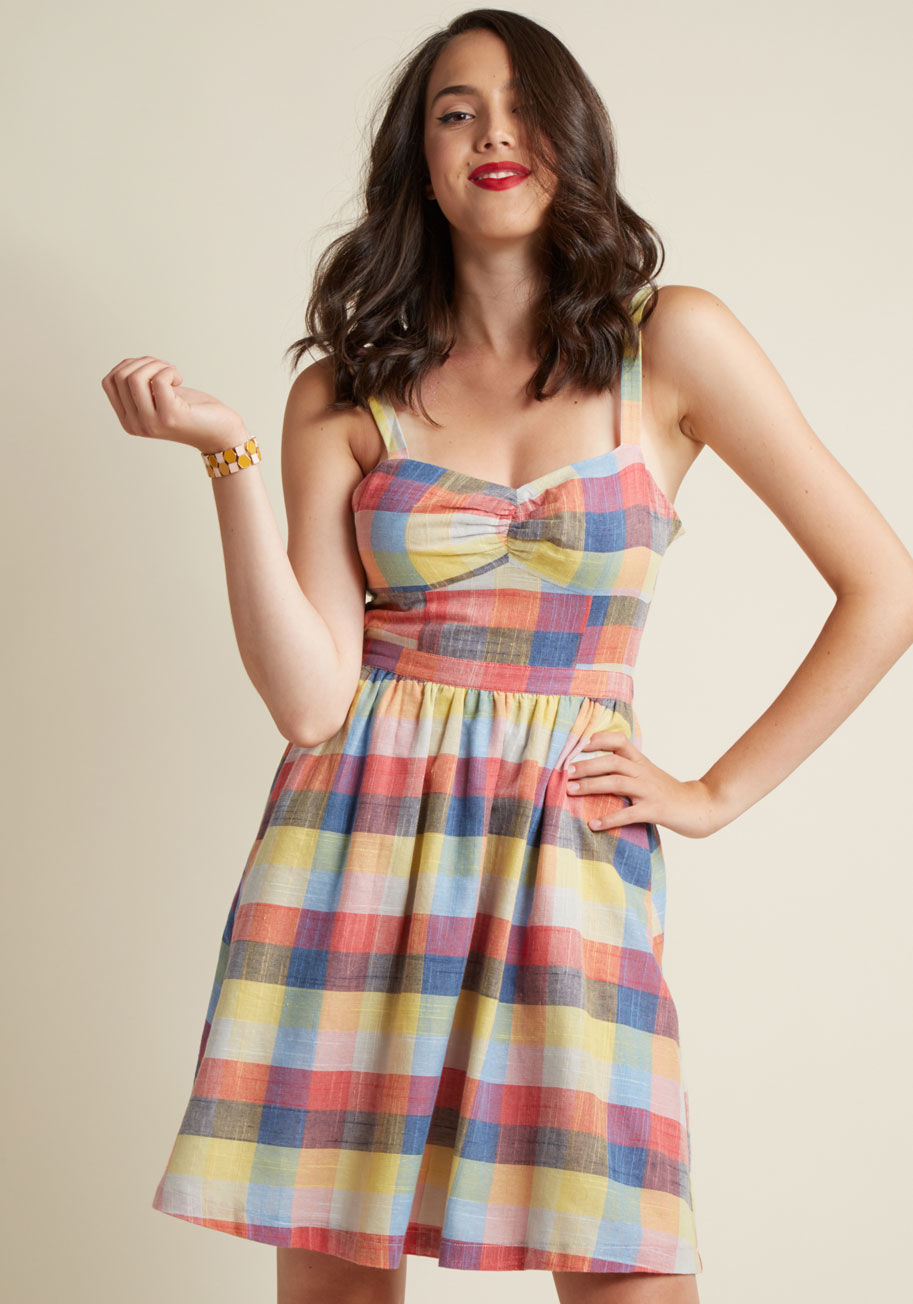  - Take a break from the ordinary by wearing this cotton dress - part of our ModCloth namesake label - to the botanical gardens. As the ruched bodice and tied open back of this sundress stand out amid the blooms, the yellow, red, and blue madras plaid attrac