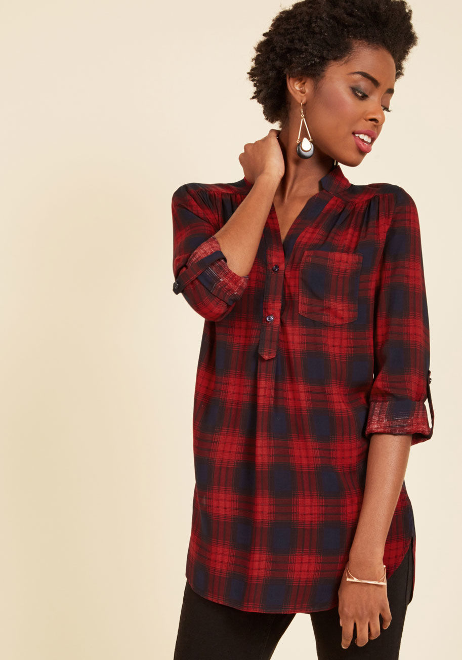  - That queue of freelance requests won&rsquo;t finish itself, so don this red plaid tunic and hop to it! A look that&rsquo;s a home office must-have, this tab-sleeved top offers a notched collar, navy lines, and a chest pocket to your day spent alternating 