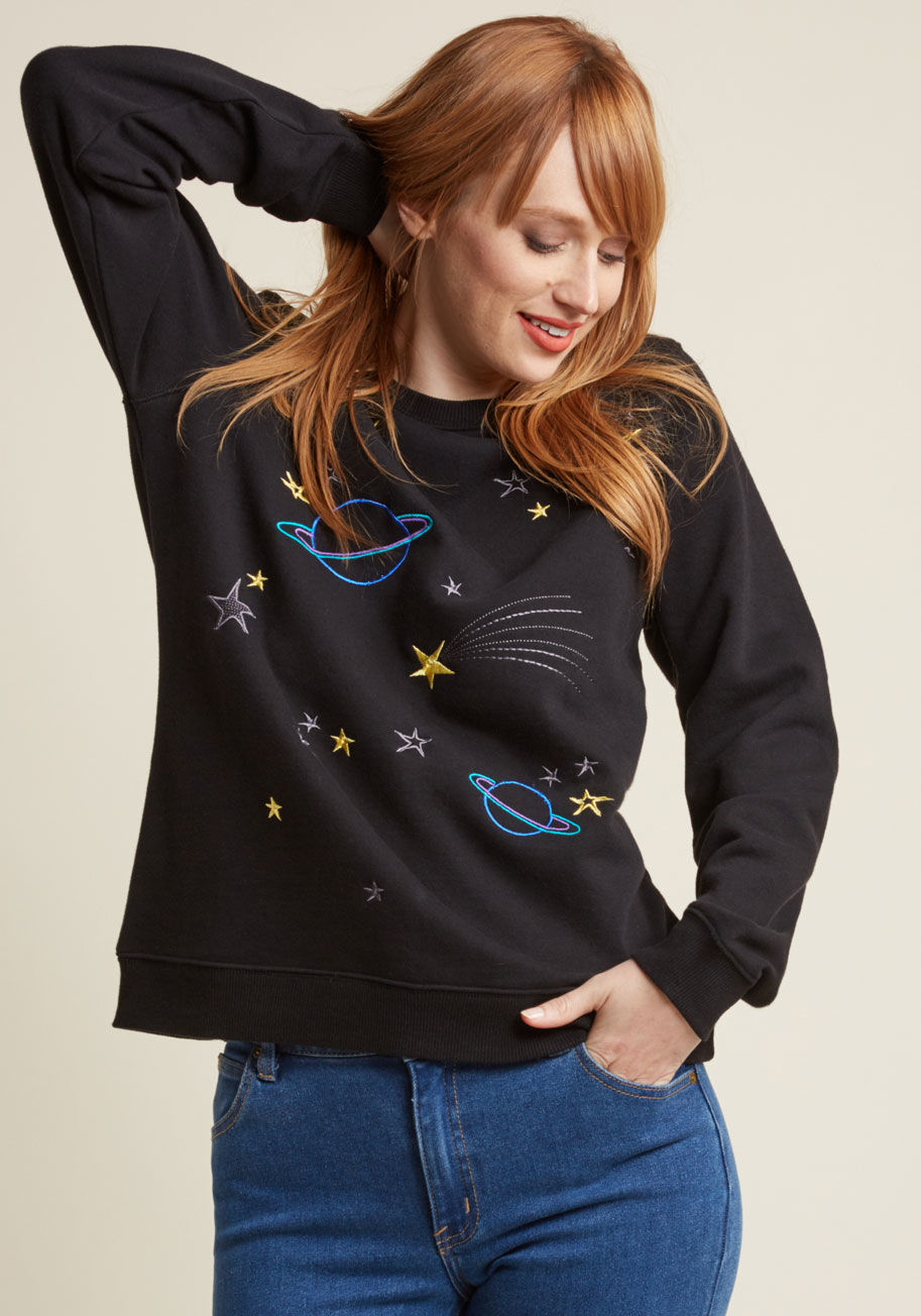  - The benefits of sporting this black pullover from Sugarhill Boutique are endless, but we're happy to list off a few of our faves! Wide smiles are inspired by the shooting stars and cool-toned planets stitched into this long-sleeved top's soft fabric, comp