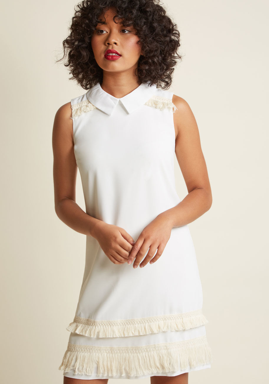  - The details of your day are destined to fall into place when you start by styling this black dress! A crisp collar, minimalist silhouette, and series of noir fringes at the shoulders and hem make this ModCloth namesake label frock the perfect mix of upbea