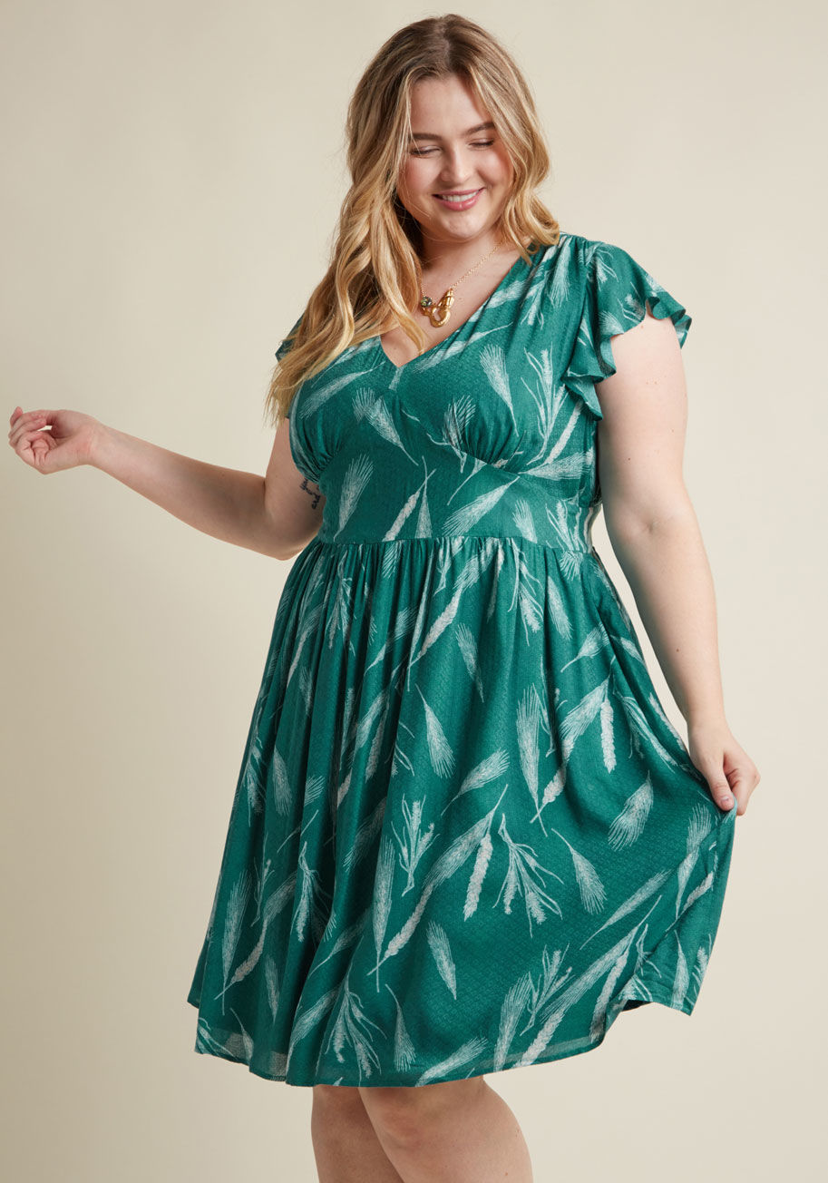  - The intersection of retro sensibility and stylish flirtation is where you'll find this green dress from our ModCloth namesake label! Fluttery cap sleeves, diamond-textured dobby fabric with a subtle sheen, and a whimsical ivory print of cascading grains a
