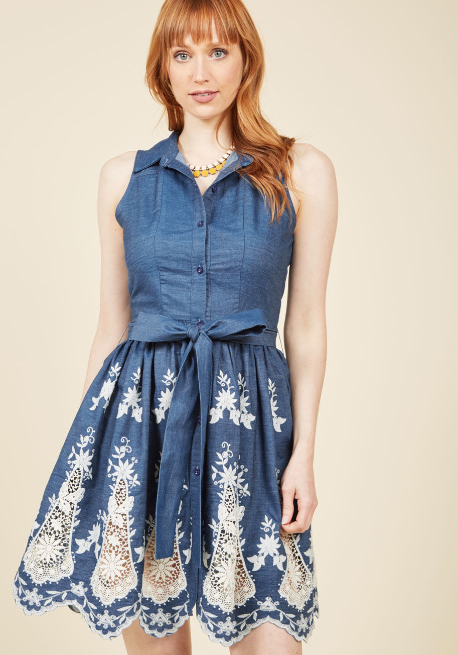  - The only thing more breathtaking than your homemade brunch spread is the chambray shirt dress you've worn for the occasion! The sheer, drop-shaped panels of crocheted lace and floral embroidery along the scalloped hem of this ModCloth-exclusive frock give