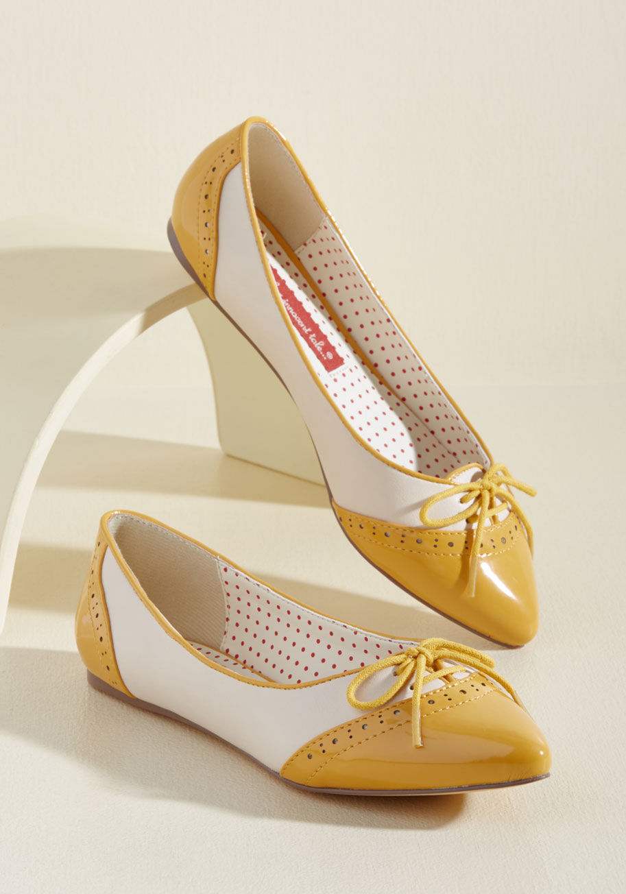  - They say an apple a day keeps you healthy - flaunt these patent, pointed ballet flats from B.A.I.T. Footwear on a regular basis and enjoy their many benefits! Never-fail noir and cream vegan faux leather shine against decorative laces and a sleek profile,