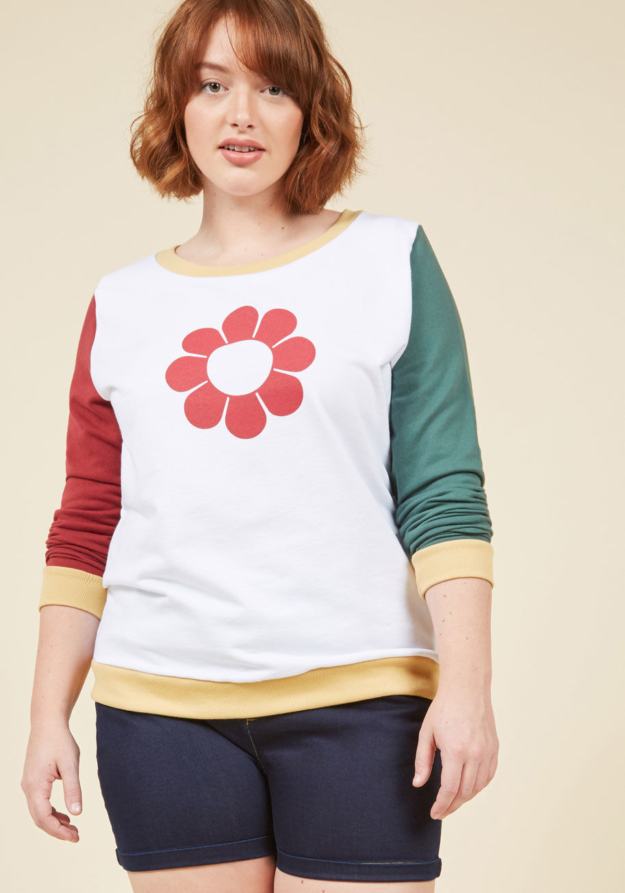  - This colorblock sweatshirt has taken flower power to the next level of stylishness! Brick red and pine green sleeves stem from the white body of this yellow-trimmed top, while a bold blossom and cotton construction secure this ModCloth exclusive as the mo