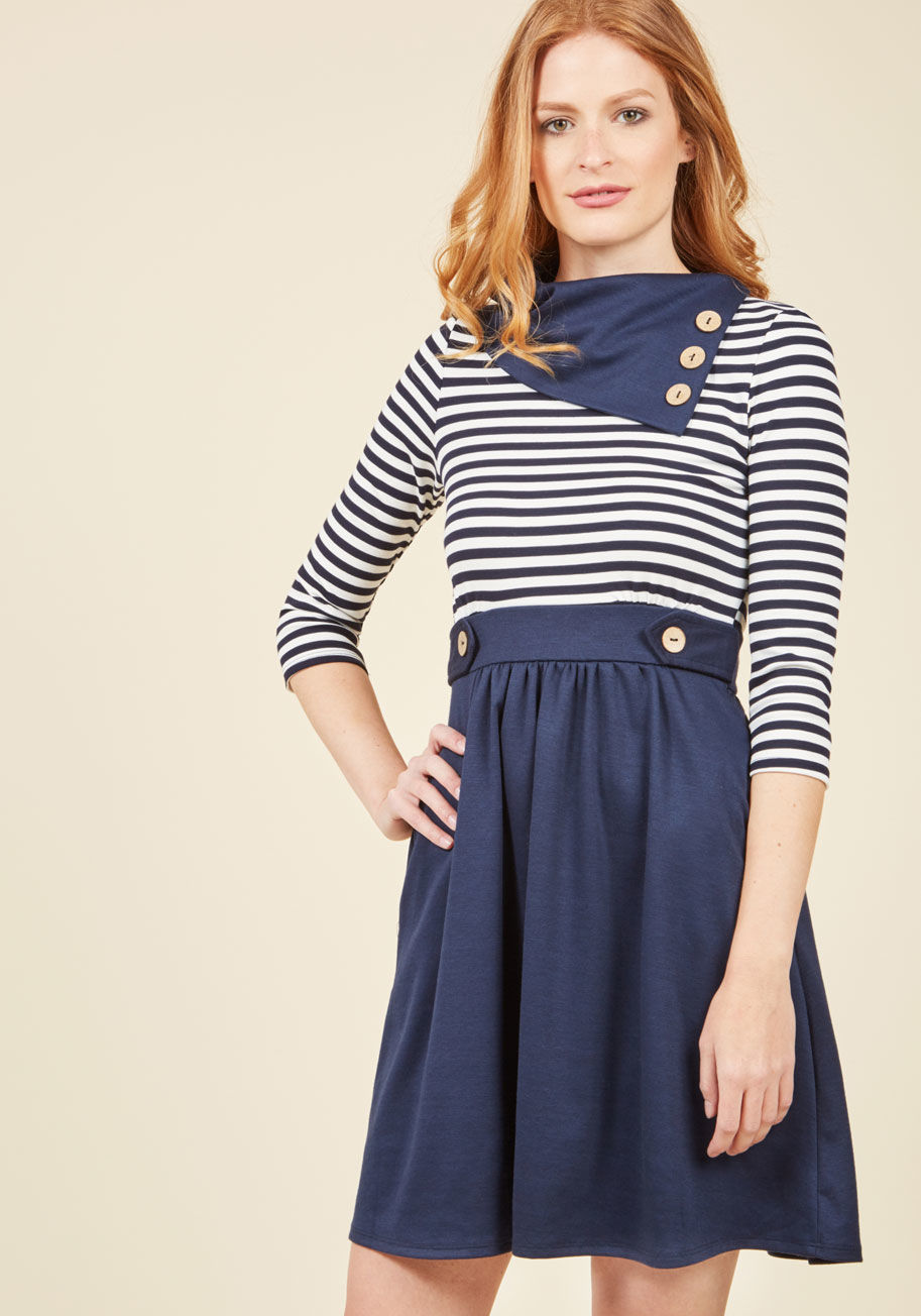  - This muted navy, floral dress is so magical, it makes you long for somewhere special and new to wear it. Take the foldover collar, embellished waistband, and decorative buttons of this knit ModCloth exclusive on a scenic getaway to actualize your stylish 