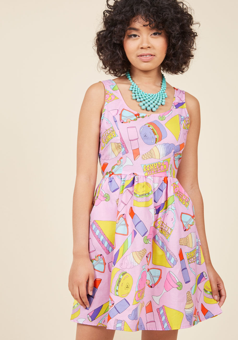  - This pink cotton dress is a festival of delights! Its simple silhouette stars a scoop neckline, princess seams, a gathered waist and perfect side pockets, while its pattern promotes lipstick, sassy sunglasses, and the best boardwalk food. If there were ev