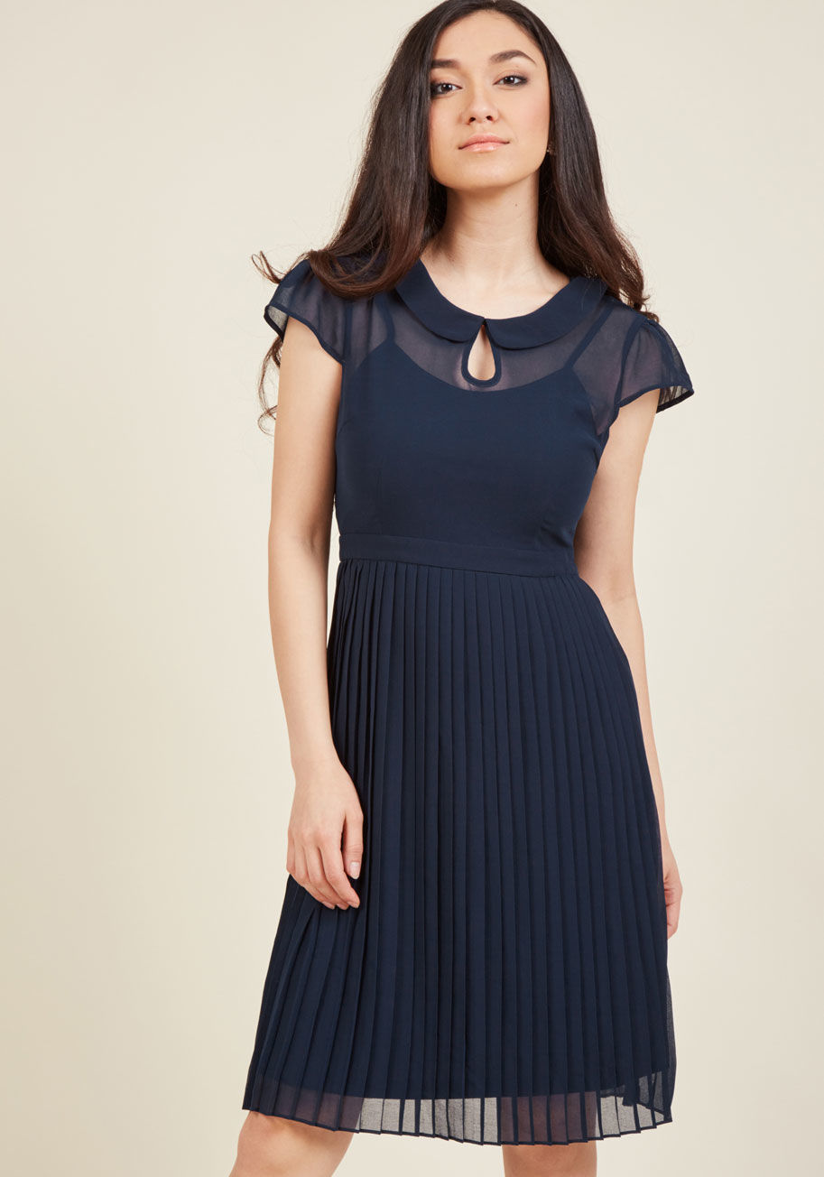  - This prim chiffon dress is just as fitting for Monday's lecture as it is for Friday's festivities! Part of our ModCloth namesake label, this navy blue lovely uses a Peter Pan collar with a cute keyhole and a pleated skirt to portray your charming personal