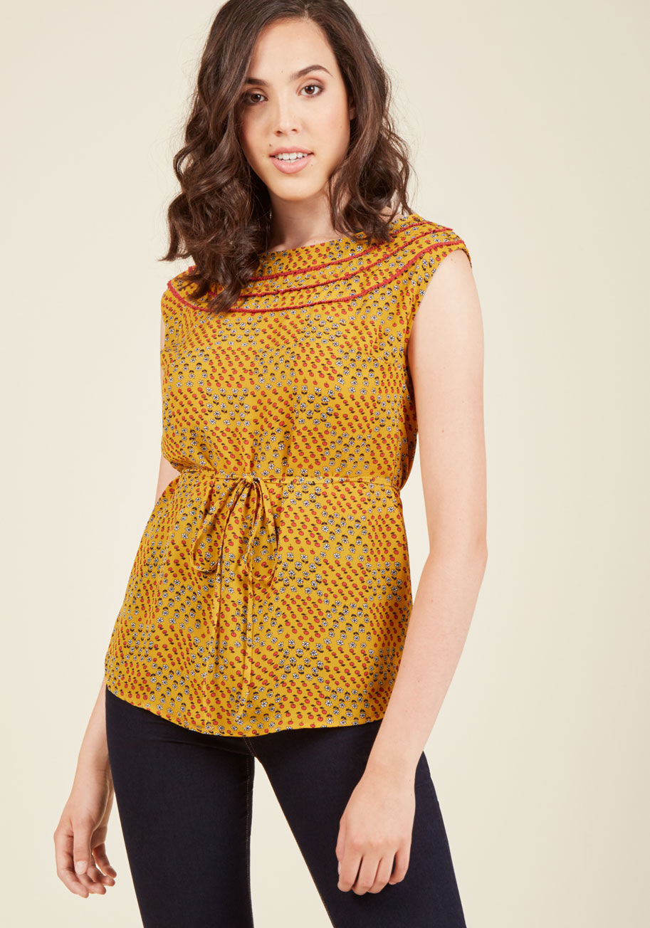  - This sash-tied tank top is proof that vintage-inspired style has a sure place