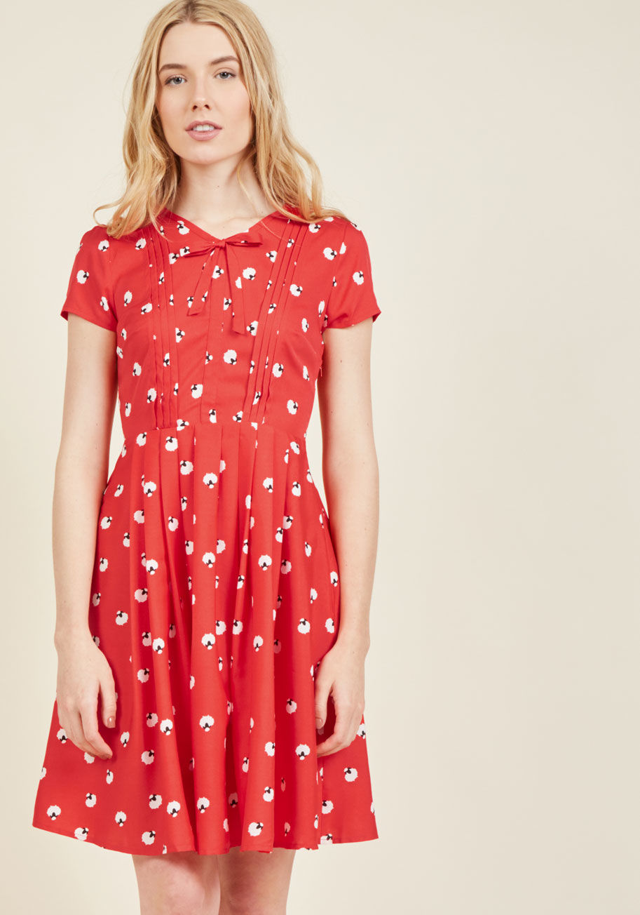  - Those seeking unique details to freshen up their wardrobe will go wild over this red A-line dress! Though its bow-topped V-neckline and pleated skirt can be considered classic accents, its pintucked bodice and quirky sheep pattern take it to a new level o