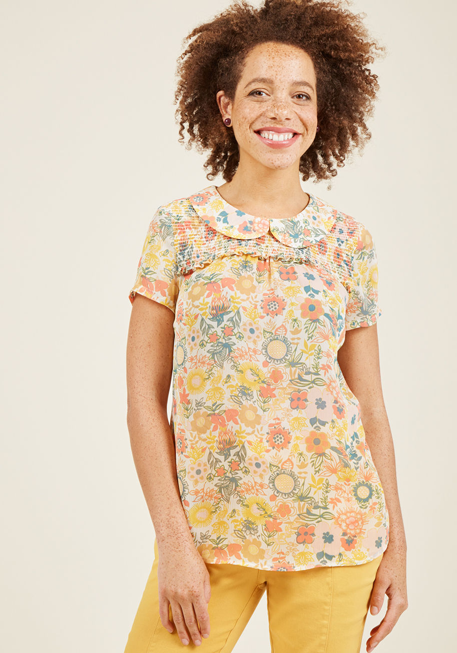  - Vintage-inspired and versatile, this sheer blouse from our ModCloth namesake label is a true wardrobe win! The Peter Pan collar, smocked yoke, and subtle bust ruffle of this pastel floral top await a whole slew of occasions and you're just the stylista to
