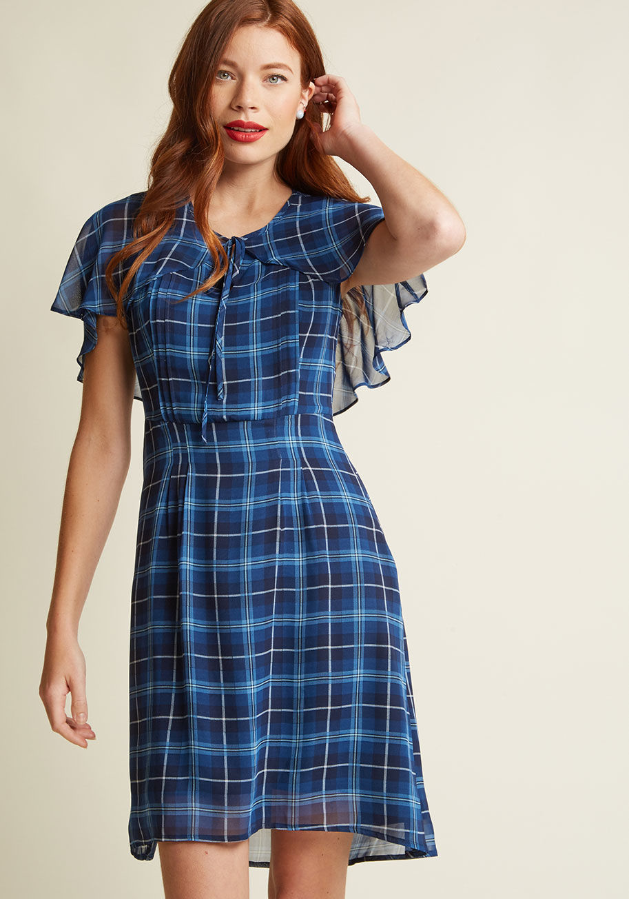  - Vintage-inspired dresses are incredible conversation starters, and this blue frock provides plenty to talk about! Equipped with a cape-style overlay tied above a neckline keyhole, bodice pintucks, and an A-line skirt, this plaid beauty from our ModCloth n