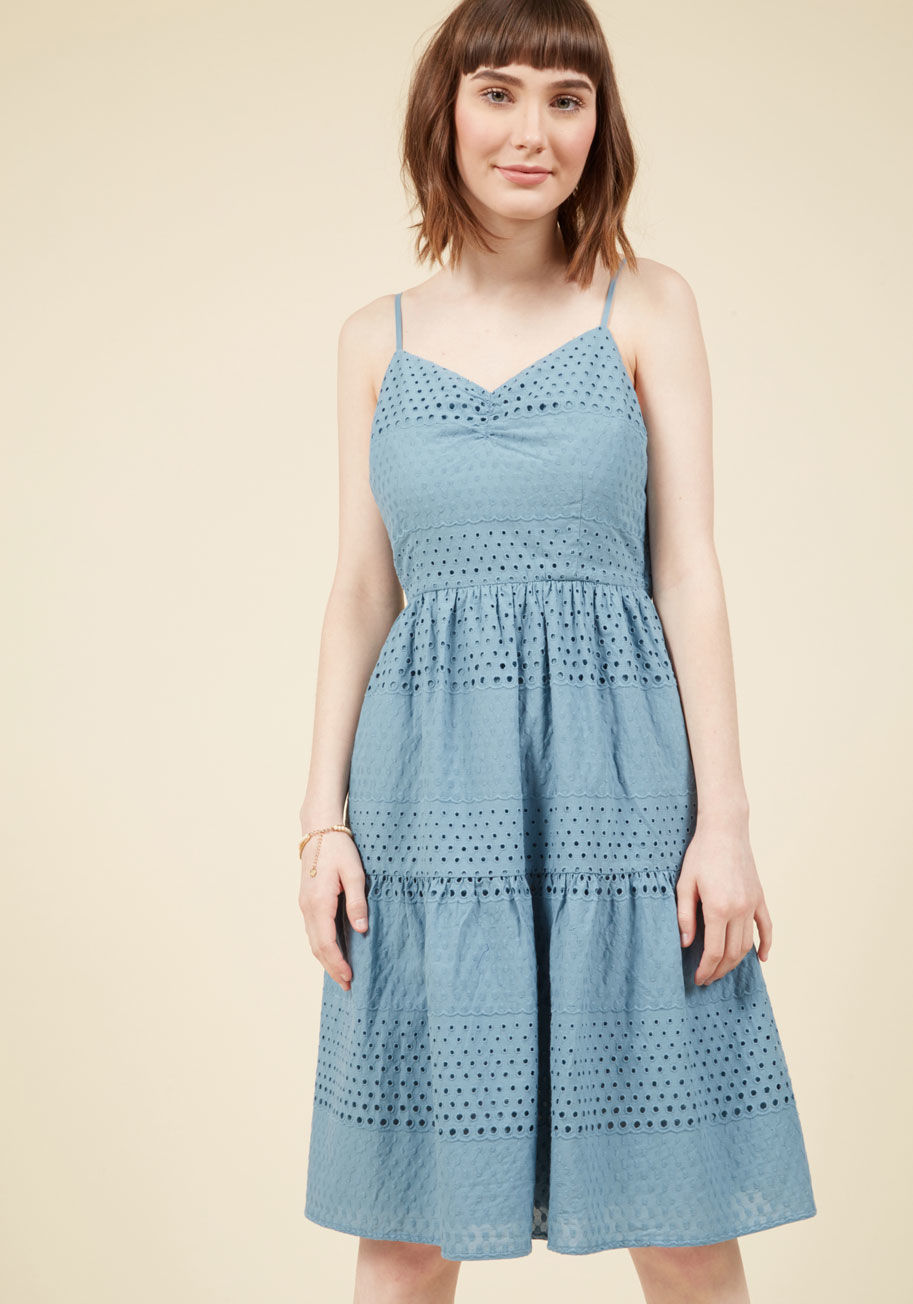  - We can't tell if your bestie's bubbly reaction is to your arrival or your sweet style! This blue cotton dress - with its alternating eyelets and dotted embroidery and its easy fit - is just as worthy of celebration as are your own charms. A pocketed part 