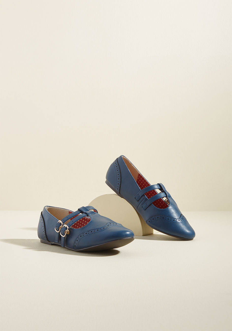  - Wear these faux-leather flats once and you'll know something's up with their wingtip-inspired silhouettes. Wear 'em twice and you're doomed to adore their double straps forever and ever! With a navy blue hue and a retro sensibility, this B.A.I.T. Footwear