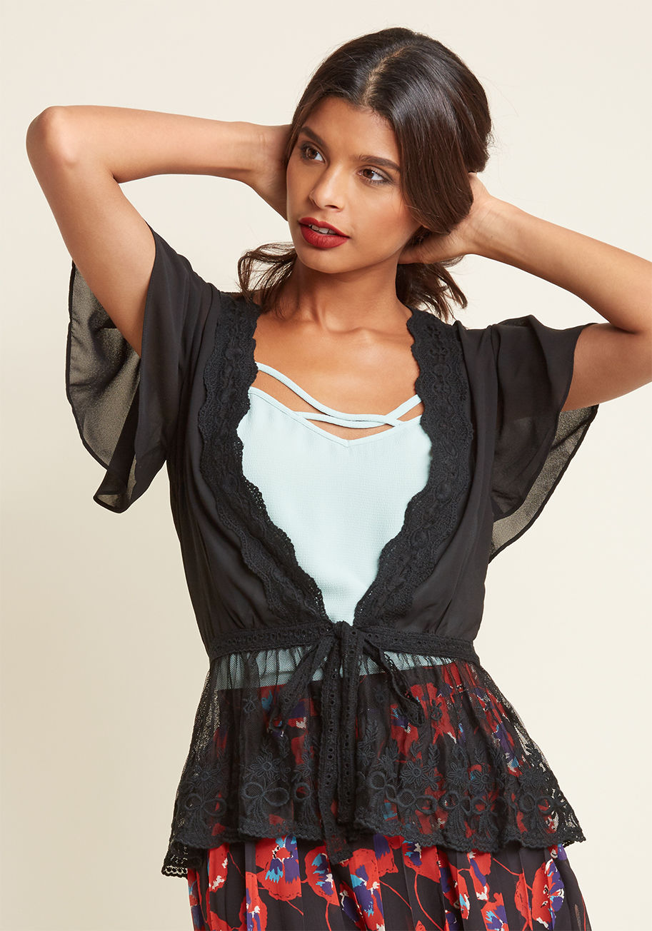  - Wearing this seafoam cardigan to brunch is a smart choice. Proof is that your bestie admiringly asks to borrow this flutter-sleeved look, which touts gossamer-sheer fabric and intricate lace accents. Each wearer's taste makes this waist-tied cardi's ruffl