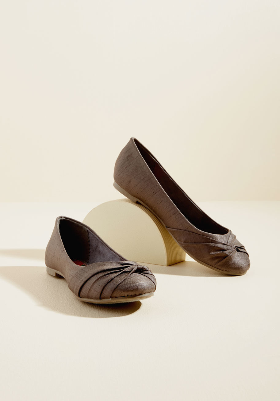  - When the weather is warm and you plan on spending the day outdoors, you always rely on these white fabric flats to take you from here to there! Adorned with floral embroidery, dainty eyelets, and knotted toes, these slip-ons look darling beneath your stri