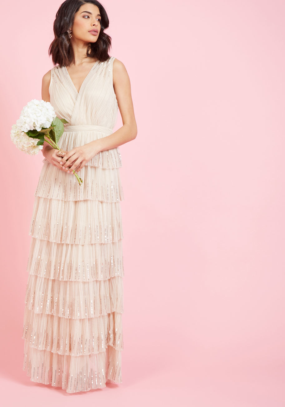  - Whether you're honoring the pioneers of tech or the trailblazers of fashion, your revolutionary look will be equally heralded with this champagne gown! A genuinely festive offering, this tiered, ModCloth-exclusive frock is the core of cutting-edge style w