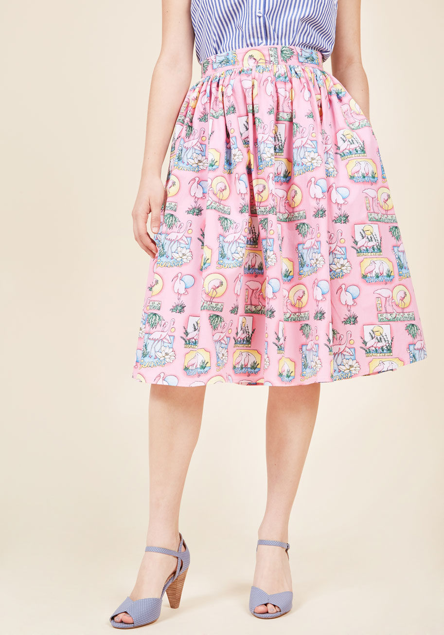  - While flaunting this pink midi skirt from Hell Bunny, you don't just fit