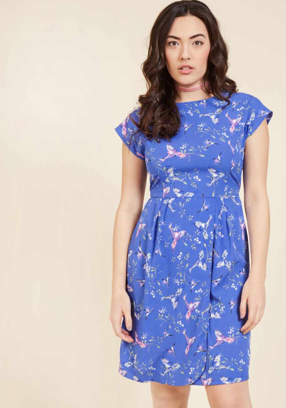  - Window shopping, patisserie tasting, and lemonade sipping are all the more heavenly with this blue dress on your frame! It displays your effortless style with its cap sleeves, pleat-accented wrap skirt, and back tie. Meanwhile, its cool-toned pattern of b
