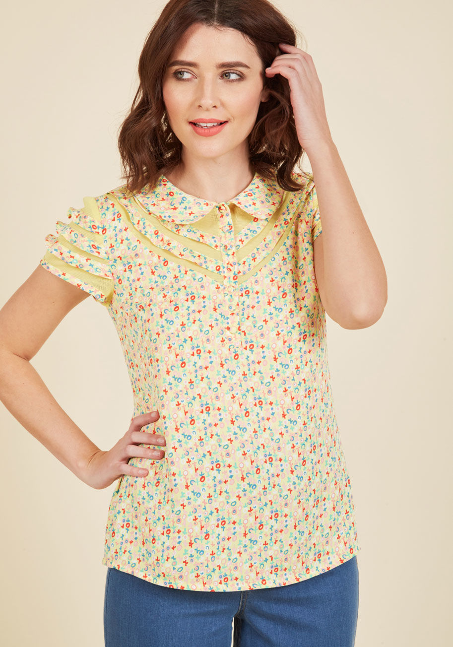  - With the way this yellow blouse from our ModCloth namesake label is designed, it's as if we made it exactly for you! The matte charmeuse fabric, pastel floral print, and diamond-mesh panels along the neckline and sleeve ruffles of this button-front blouse