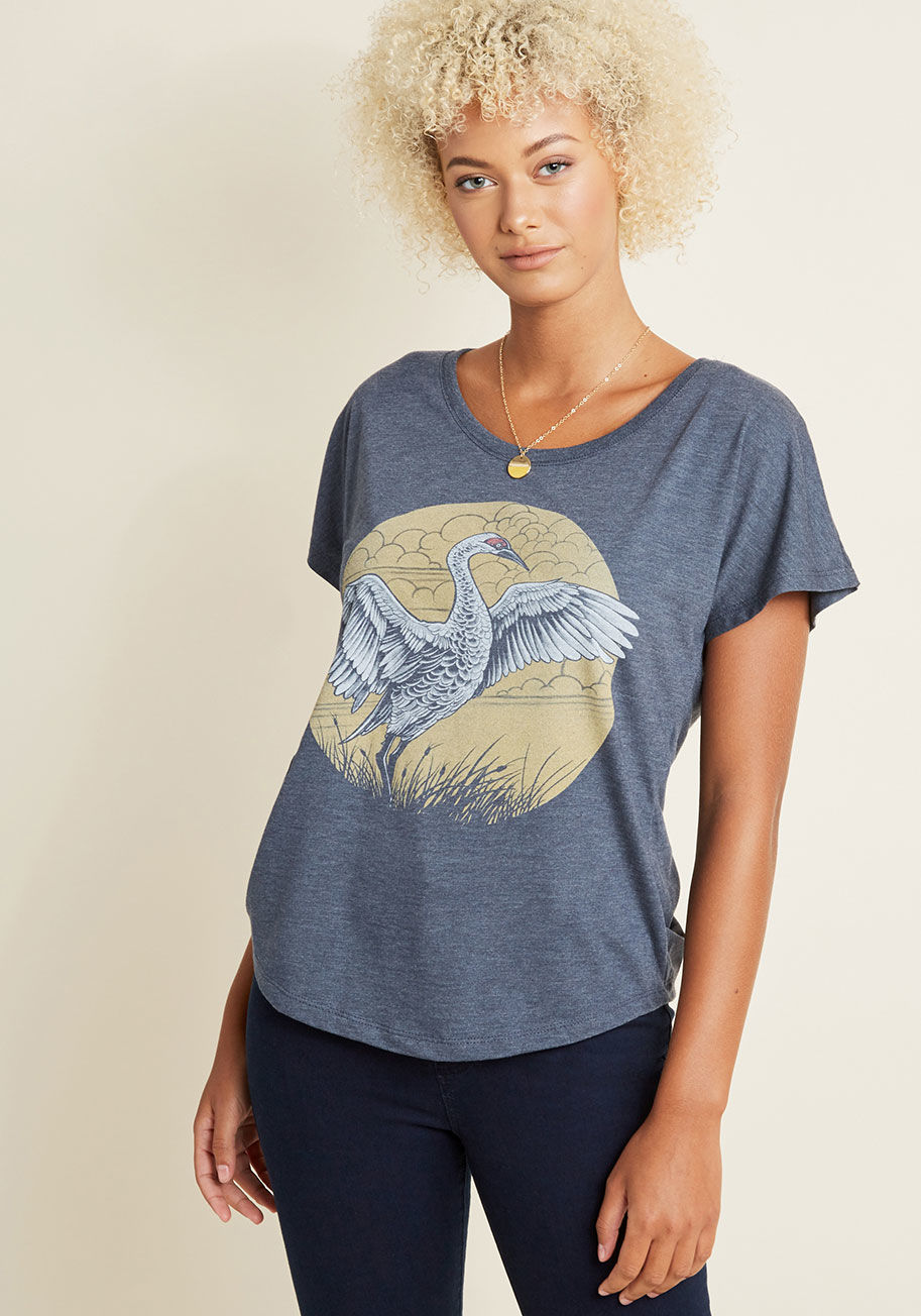  - With this crane-printed T-shirt