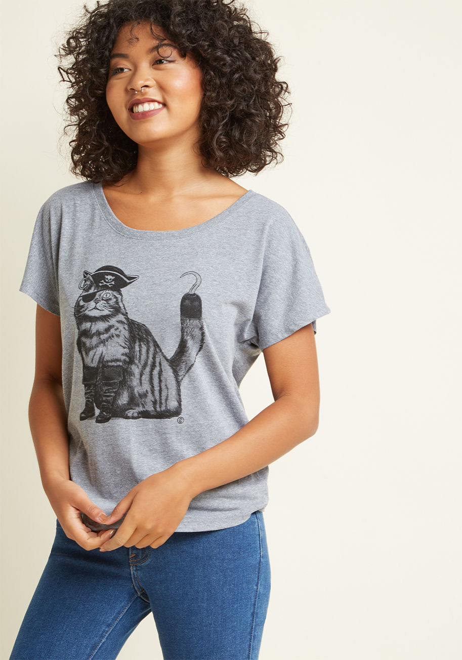  - With this heather grey T-shirt on deck, adventurous style awaits! With a wide neckline, dolman short sleeves, and a quirky screen print of a cat disguised as a privateer, this true treasure treasure of a graphic tee offers a world of outfitting options. A