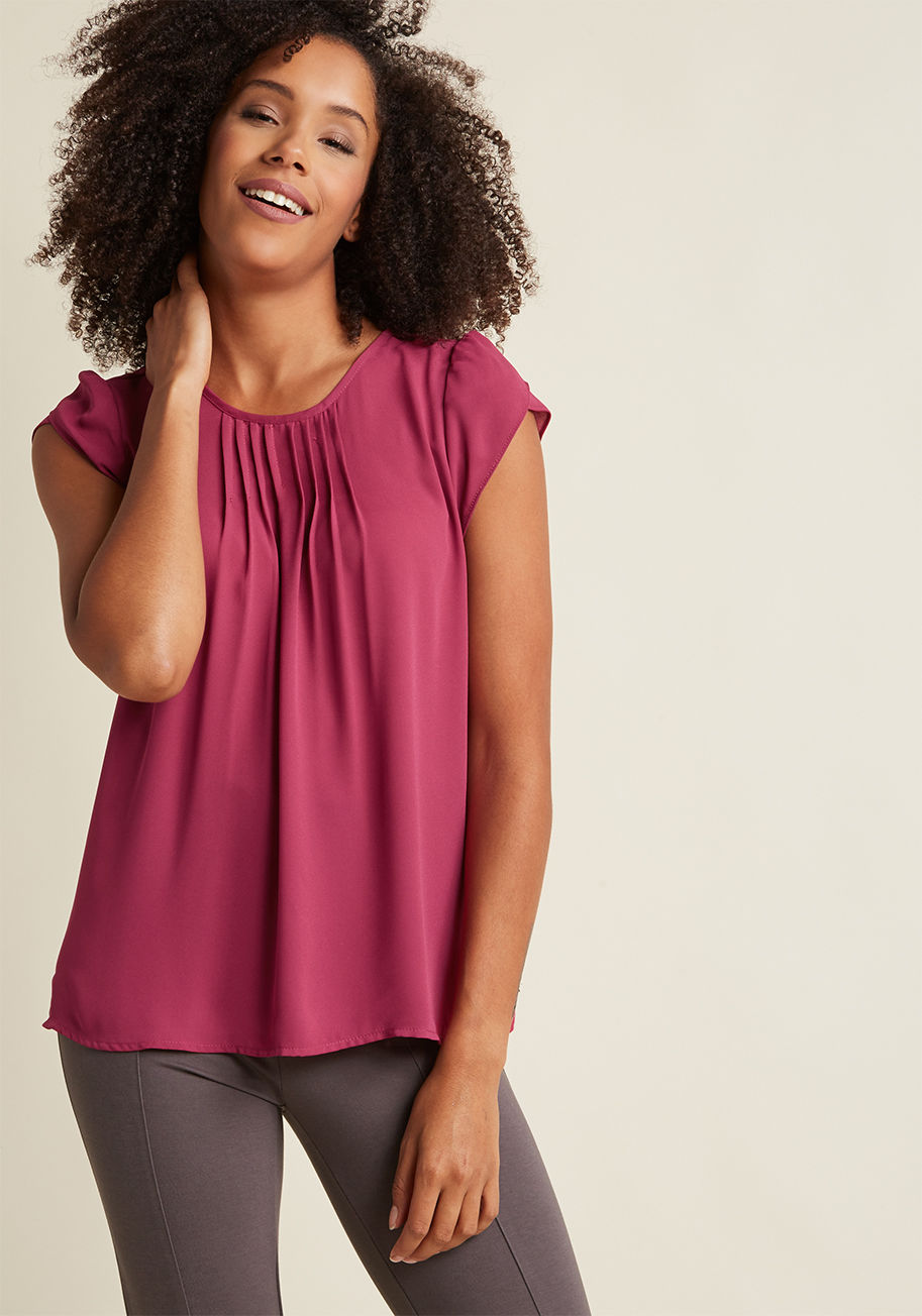  - With your air of confidence and this blue-green blouse, you&rsquo;ll engage your employees with awesome aplomb. Touting pintucked details below the neckline and tulip sleeves, this top nods to the graceful, business chic style that makes you one charismat