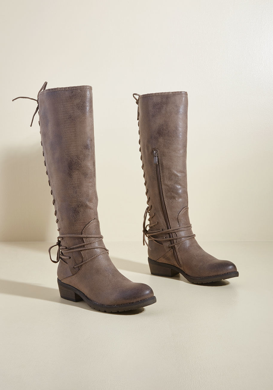  - You and your bestie looked at these knee-high boots and had the same thought - Perfect for my commute! We're certain the back laces, inner zippers, and versatile taupe tone of this faux-suede footwear will serve both of you equally well as you ramble to y