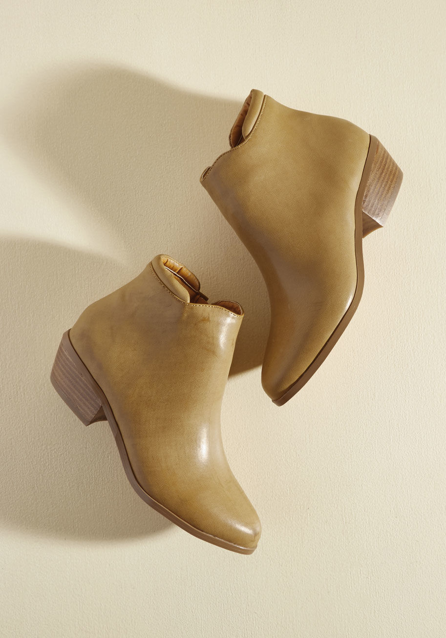  - You know all the ins and outs of wear-everywhere fashion, and these black ankle boots are step one for success! Made from smooth faux leather and touting casual stacked heels, these bold ModCloth-exclusive basics are a go-to that marks your ensemble with 