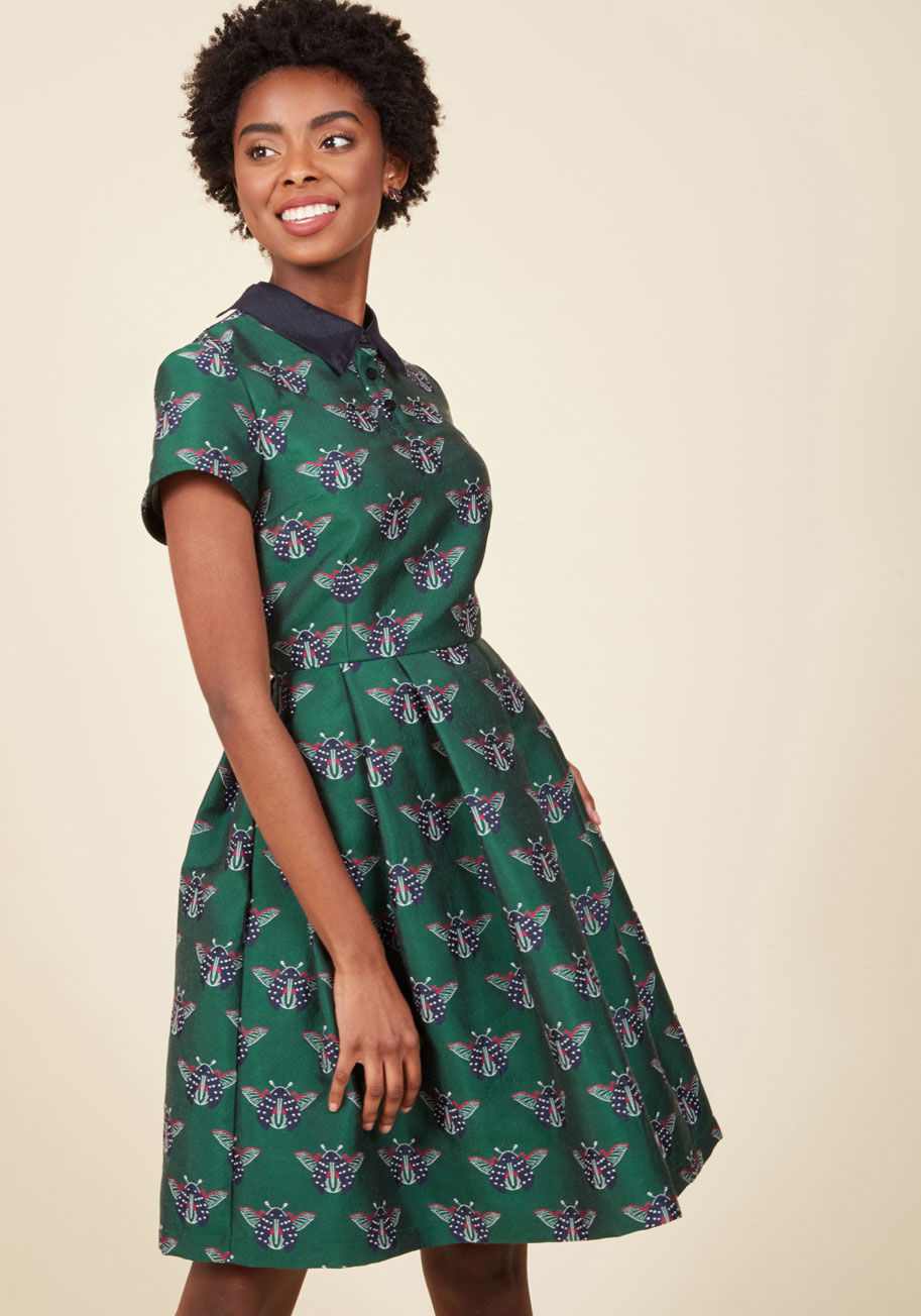  - You know us best for our elegant looks and surprising finds - now, get to know this green shirt dress from our ModCloth namesake label! Celebrating a divine style perspective with its black collar, crystalline buttons, hidden pockets, and blue floral prin