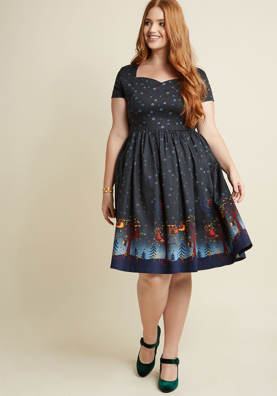  - You may want to take a seat before the nighttime motif of this Banned midi dress sweeps you right off your feet! Cap sleeves frame the retro neckline of this stretch-cotton number, while sleek princess seams, hidden pockets, and a border print of sleepy o