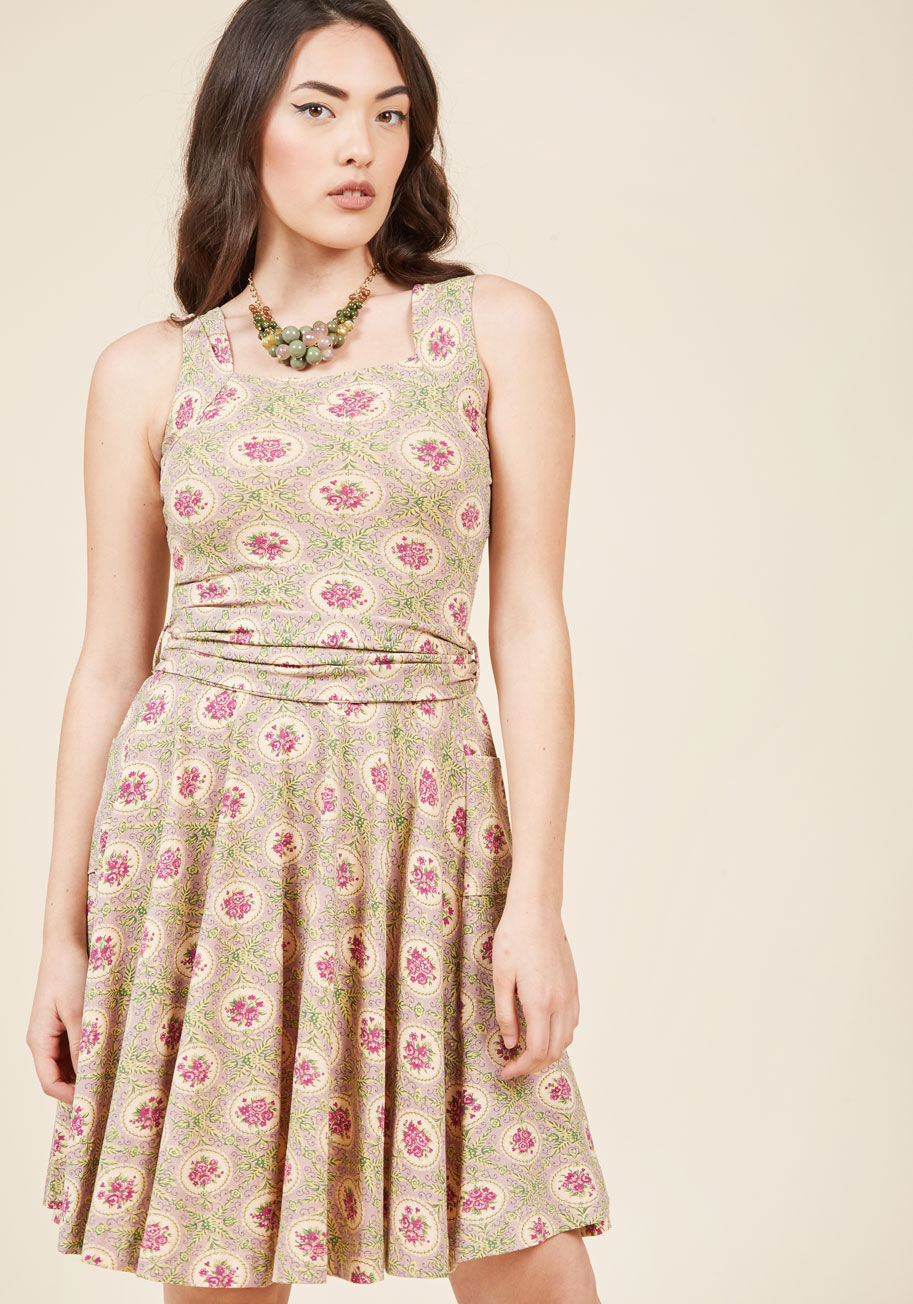  - You'll be flooded with invitations when exhibiting this finely tailored frock by California-based brand Effie's Heart! This muted green dress features a print of pale ecru swirls, a waist tie for a cinching, and a design that is at once classic and modern