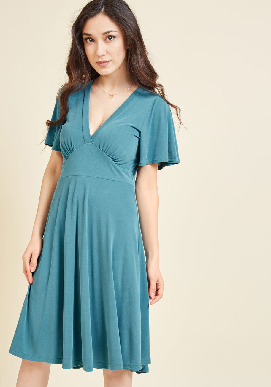  - Your daily activities take on a simplistic vibe with this muted teal dress accompanying you around town! Keeping you comfortably chic with its flowy short sleeves, V-neck, and empire waist all drafted from ultra-soft, brushed jersey knit fabric, this froc