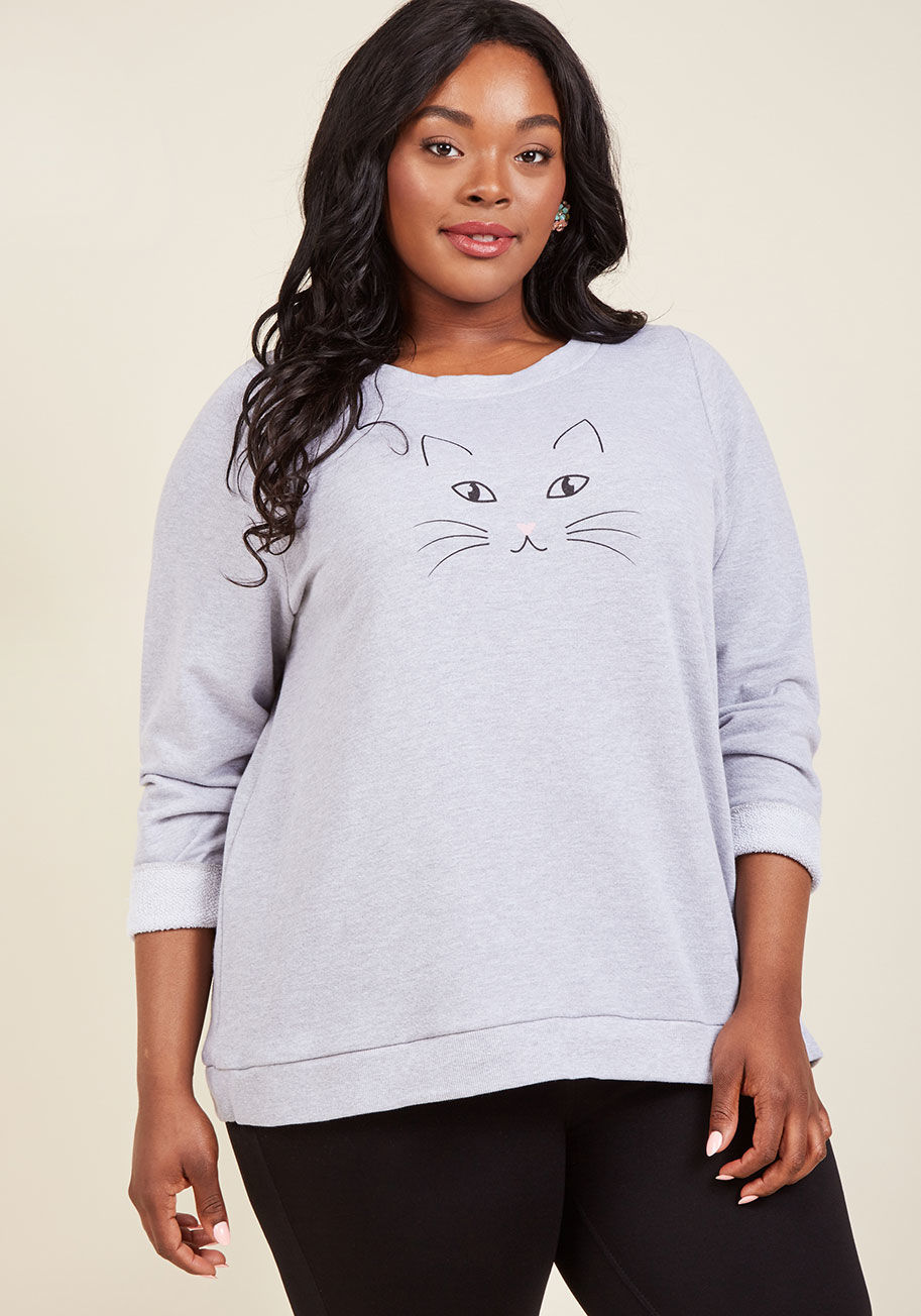  - Your idea of letting loose is slipping into this heather grey sweatshirt and unleashing the cat naps! Made from comfy cotton and screen printed with a pink-nosed kitten face, this ModCloth-exclusive pullover really starts the party. Salut!