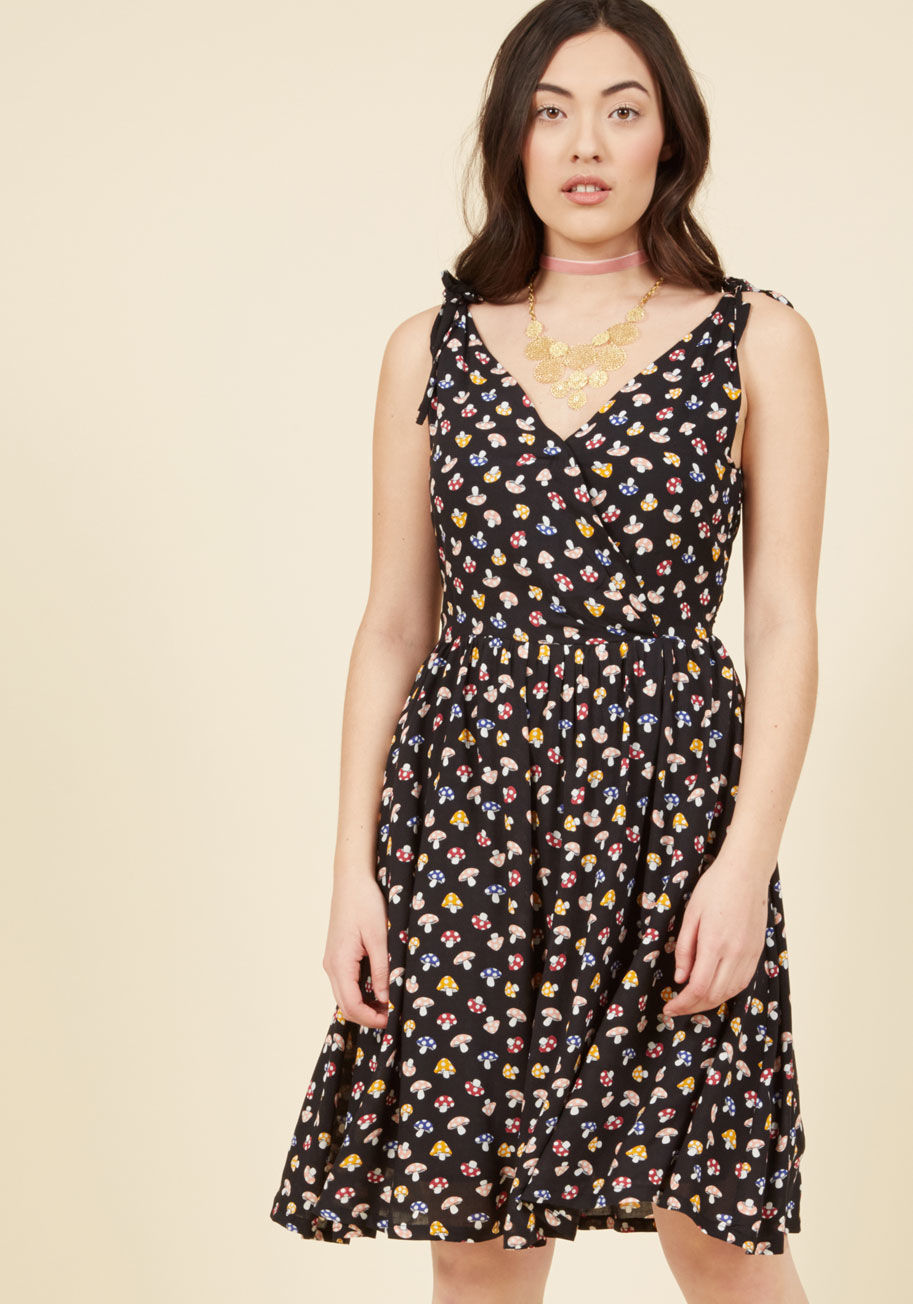  - Your style request is simple - a fun frock with a timeless silhouette and a kick of quirk. Luckily, the answer is as easy as this black dress! Mushrooms