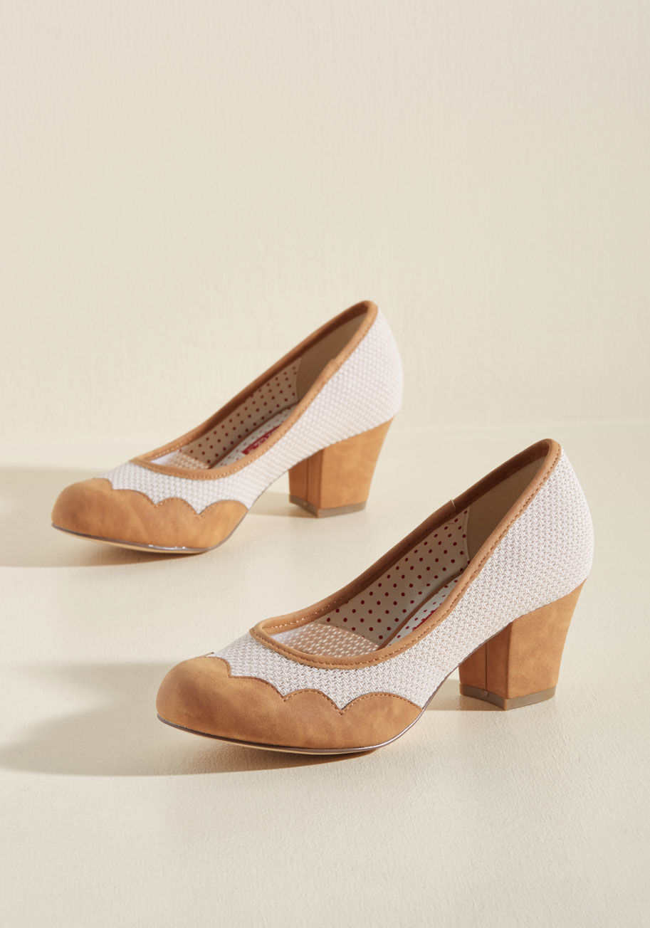 - You're revered for your ever-evolving fashion sense, and your pals can't wait to witness your next wardrobe pick. Lucky for them, your debut of these block heels from B.A.I.T. footwear will be well worth the anticipation, for their wavy caramel toes and s