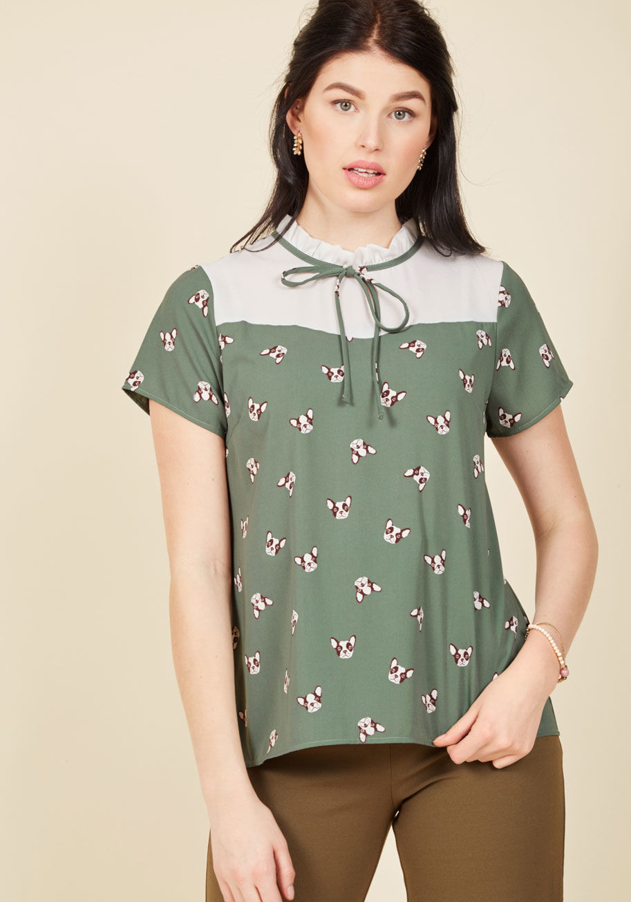  - You've got organization mastered, and with looks to match! This rich sage blouse employs a Victorian-inspired ruffle collar, white illusion neckline, and quirky Boston terrier print to bring a little lightheartedness to your every obligation!