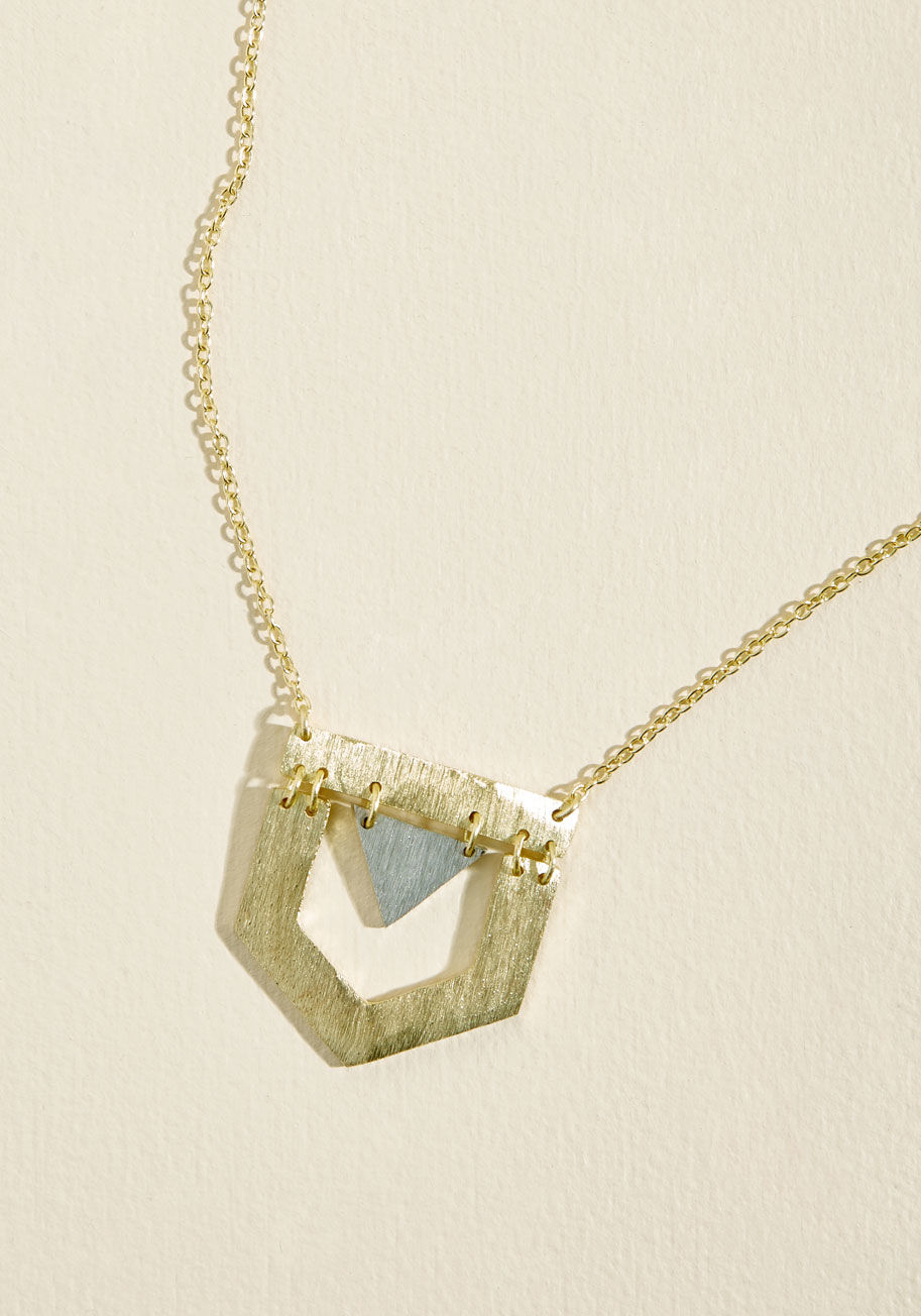 Your fave kind of necklaces feature fab charms - including and especially this Mata Traders offering! Hanging from a fine gold chain, a gold-and-silver geometric pendant pushes the envelope on current elegance. Feminist-minded Mata Traders fights poverty  by 1442-3011-0