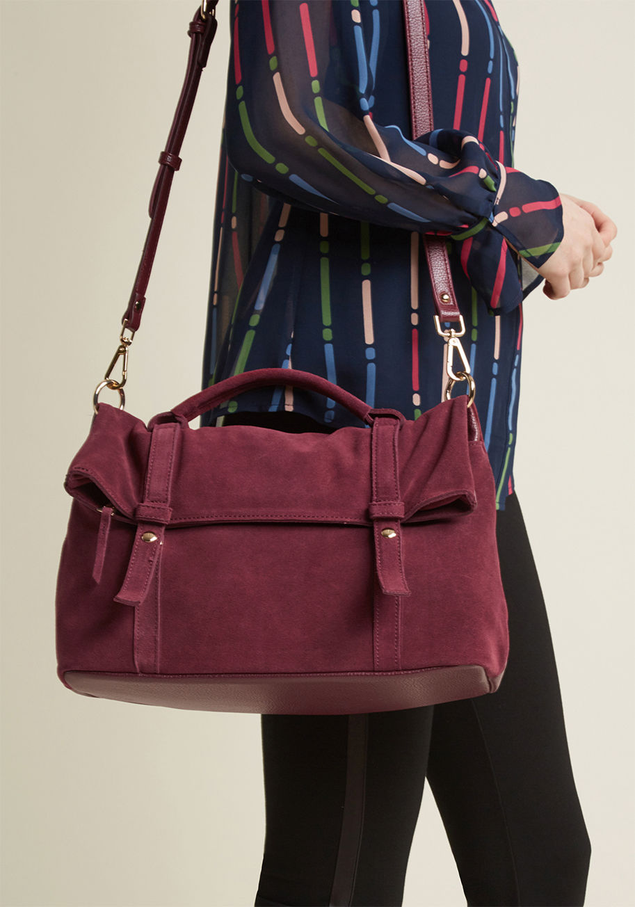 Colleagues and passersby alike will have plenty to say about this suede bag over your shoulder - and we guarantee it'll be pure praise! Gold hardware and a sleek leather back contribute to the conversational aesthetic of this work-ready purse, but the hid by 14995ML - MODA LUXE STYLE