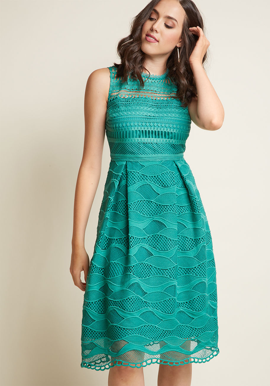 In a world of endless cocktail dresses, what makes this aqua midi rise above the rest? For starters, its design is entirely exclusive to ModCloth - from the illusion neckline and matching hem to geometric and abstract motifs crafted by AFA7151