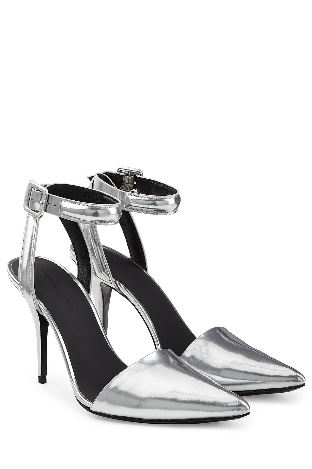 From the glossy metallic finish to the sharp pointed toe, th by Alexander Wang
